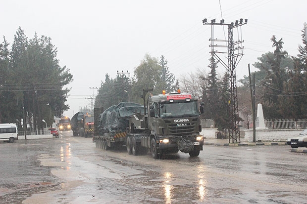 Sağanak yağmur altında sevkıyat